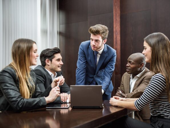 Group of multiethnic busy people working in an office Businesspeople, teamwork. Group of multiethnic busy people working in an office